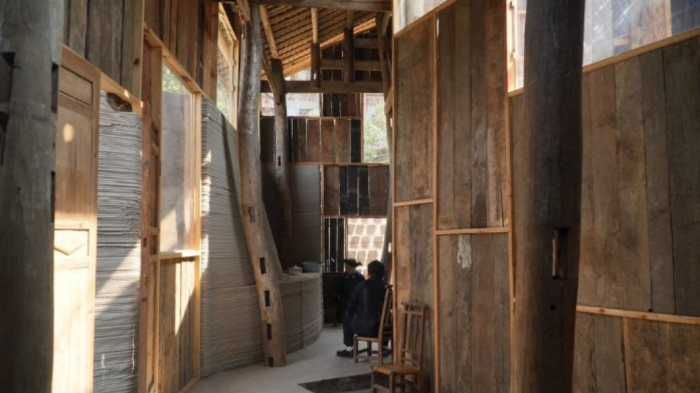 بازسازی یک خانه چوبی با ادغام دیوار های پرینت سه بعدی شده